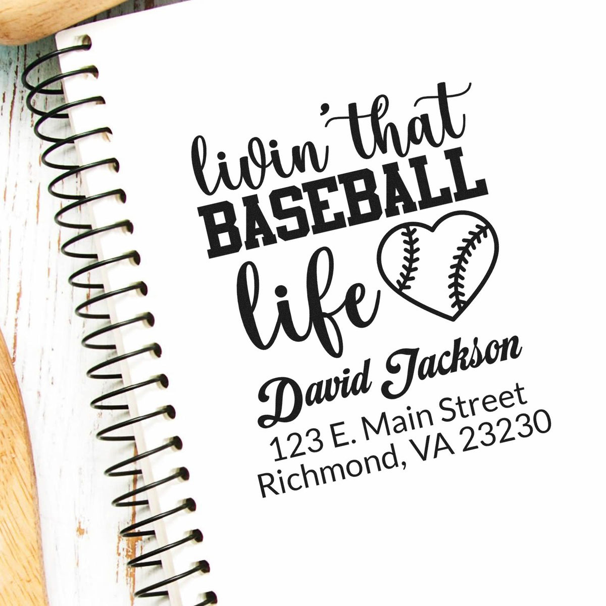 Personalized baseball rubber stamp design with livin that baseball life, heart baseball graphic, name, and address.