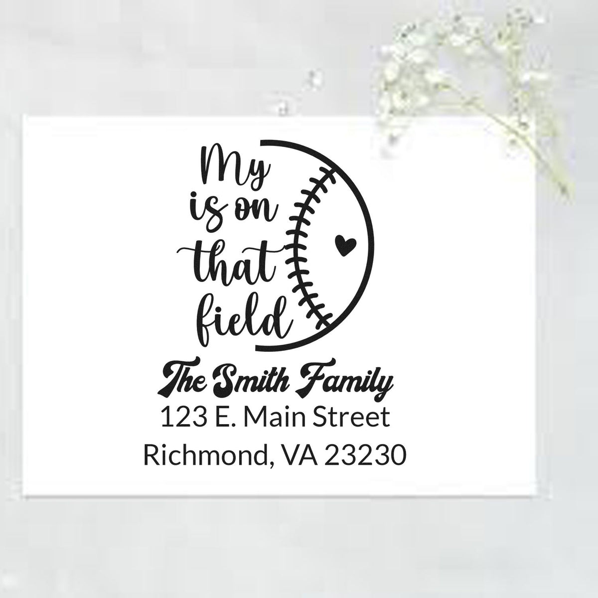 Custom baseball return address rubber stamp for The Smith Family with heart-and-field design.