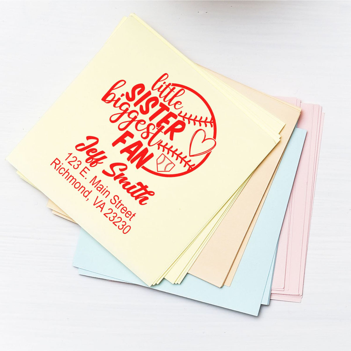 Personalized rubber stamp for a Little Sister Biggest Fan baseball-themed address stamp on pastel stationery.