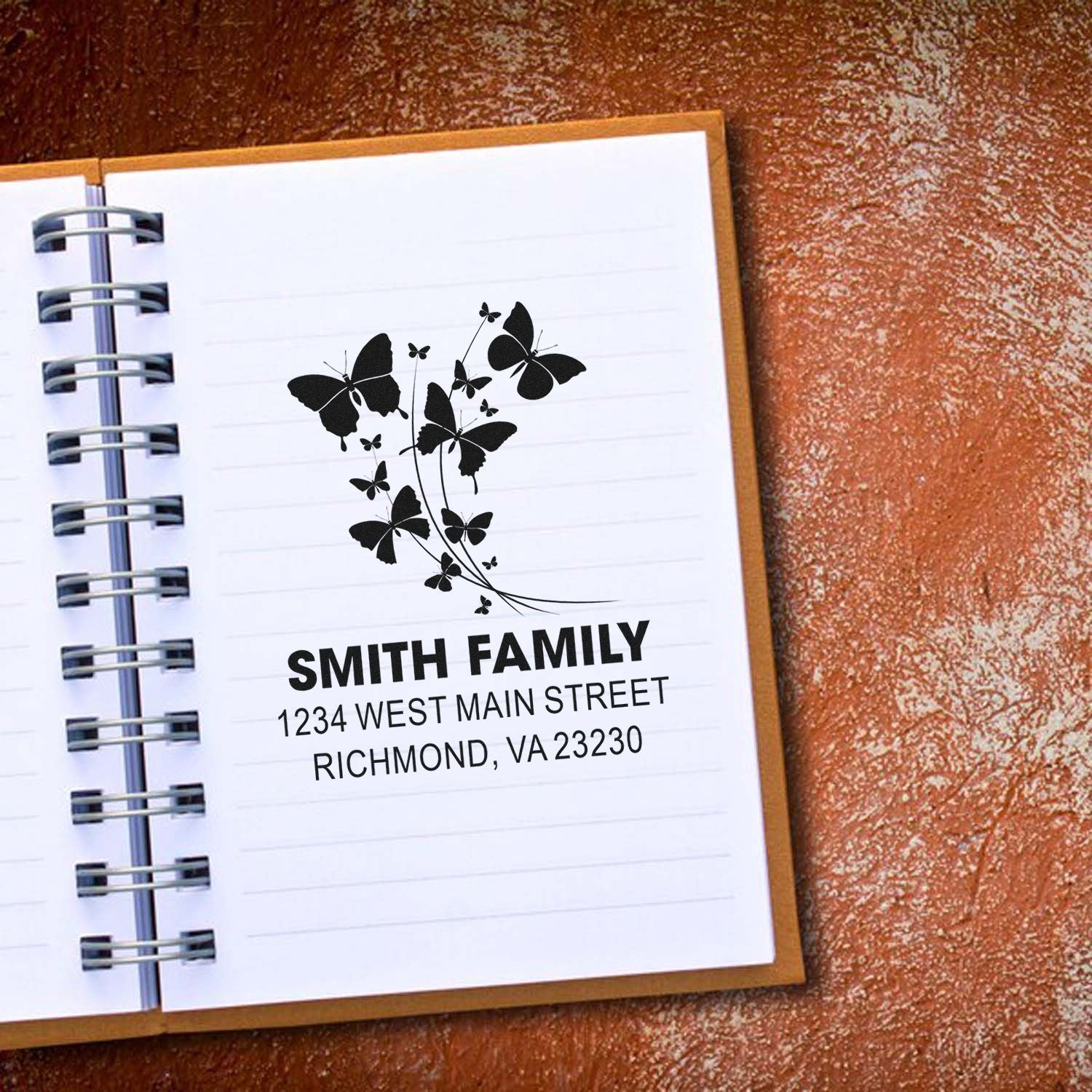 Custom butterfly return address rubber stamp for the Smith family, personalized with name and Richmond, VA address for stationery.