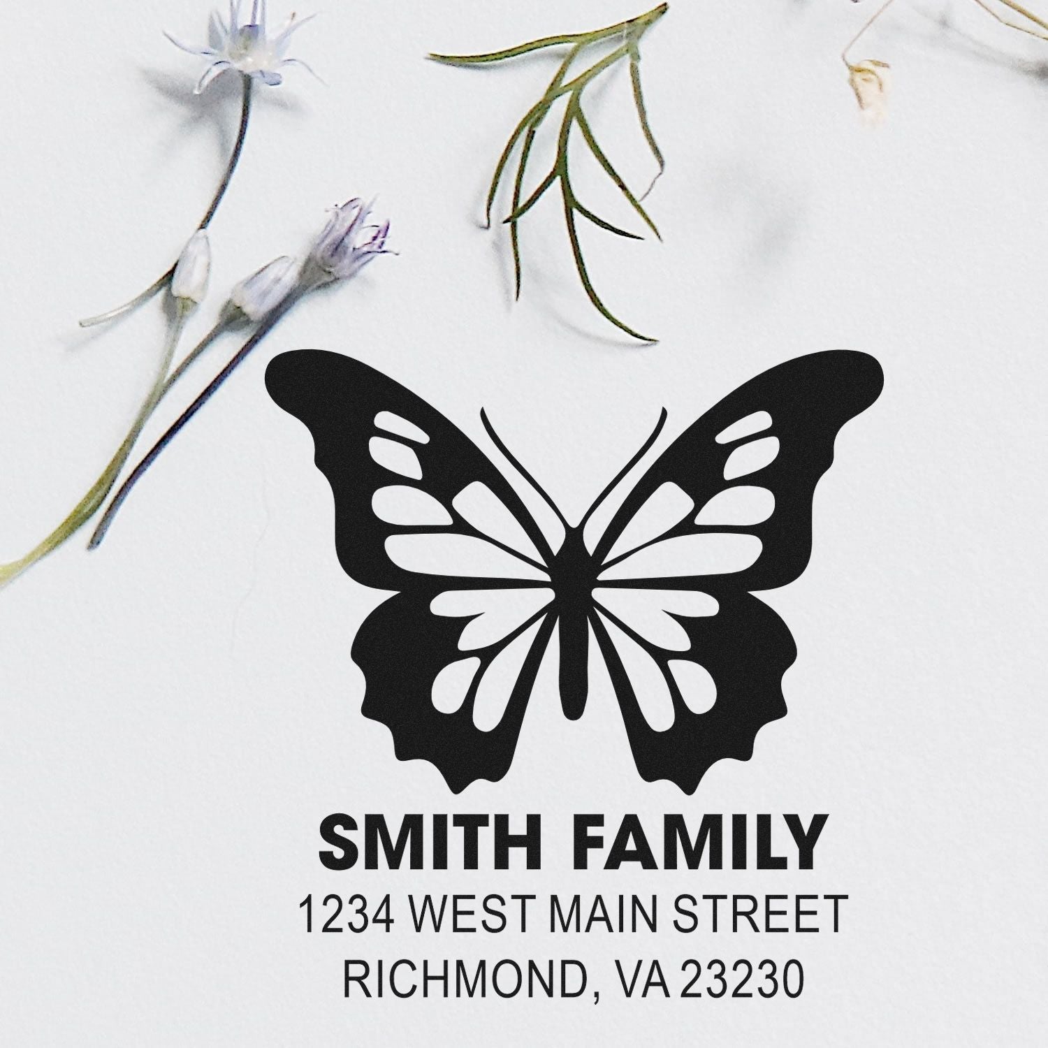 Custom butterfly family address rubber stamp with Smith Family name and Richmond, VA 23230 return address.