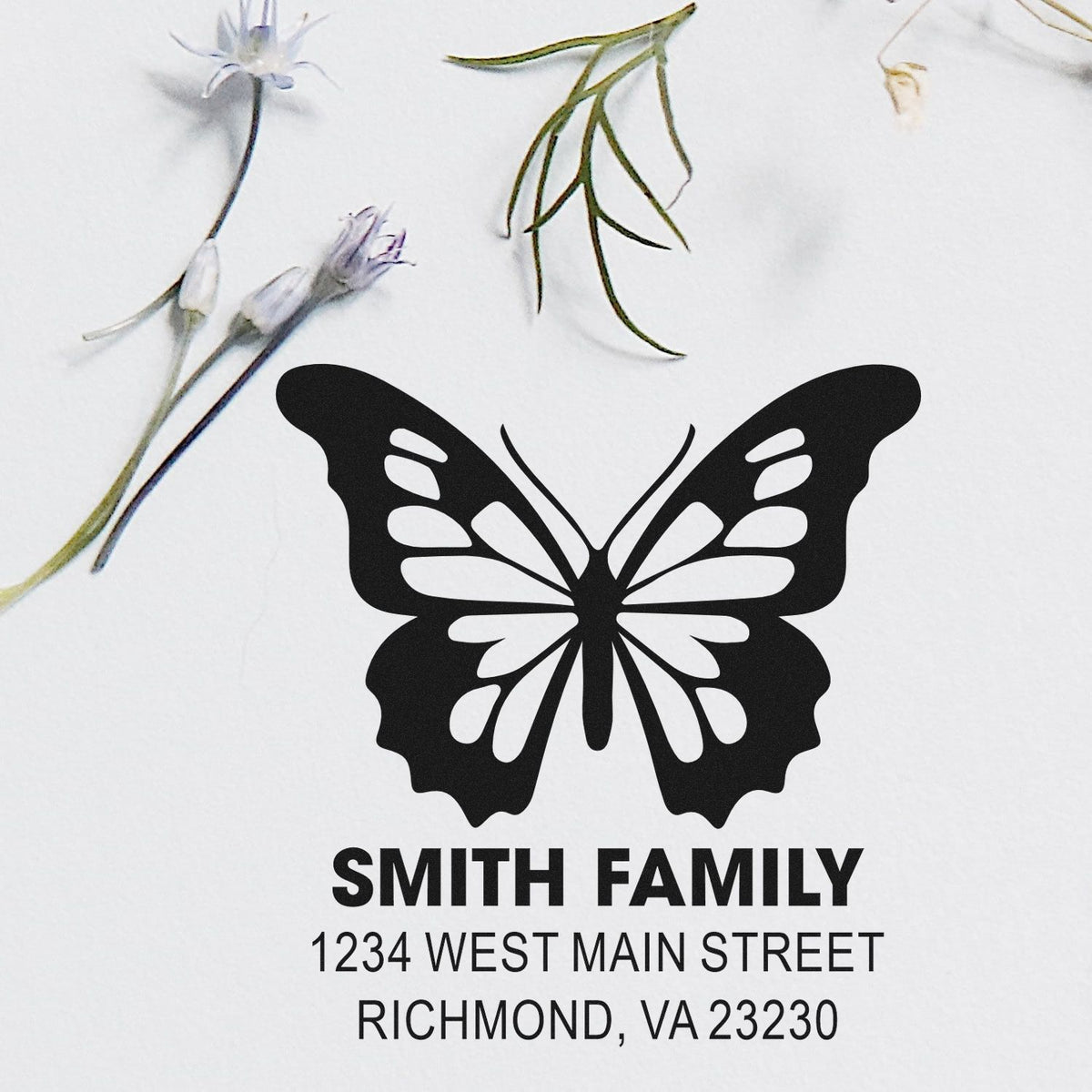 Custom butterfly family address rubber stamp with Smith Family name and Richmond, VA 23230 mailing details.
