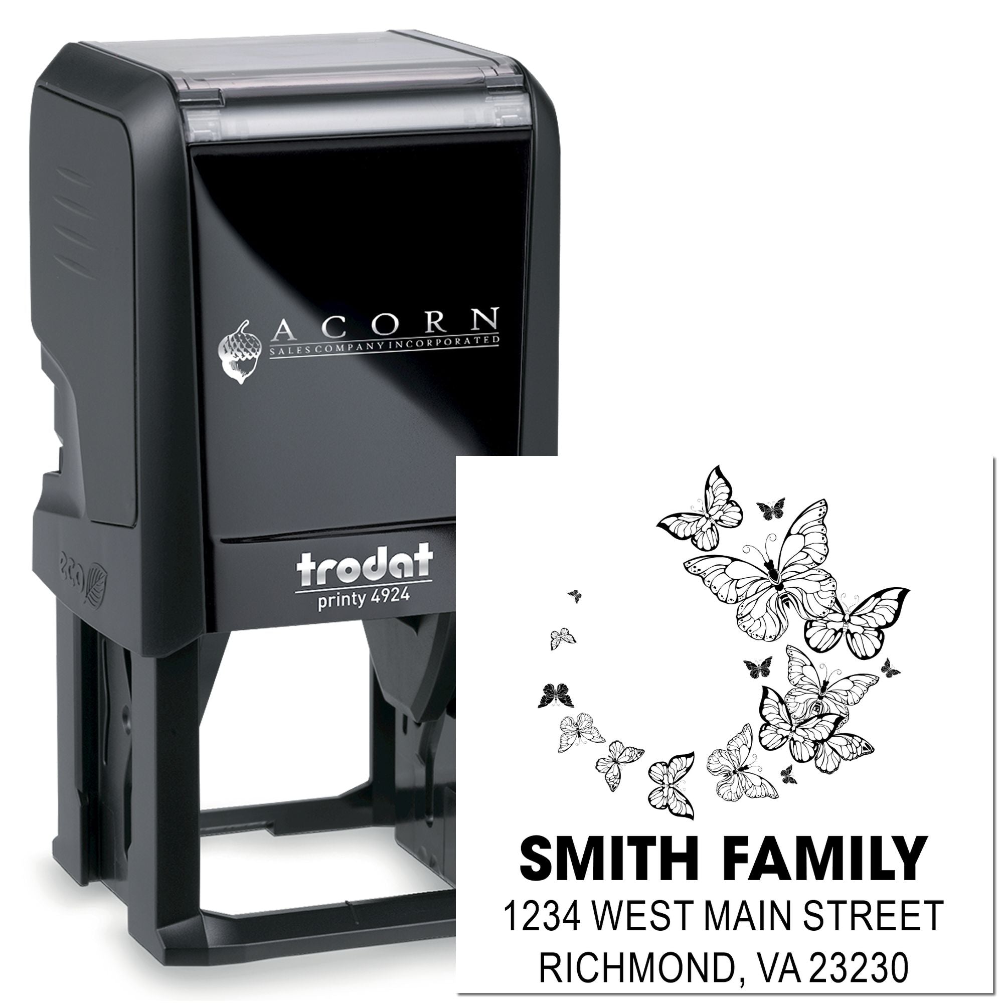 Trodat Printy self-inking rubber stamp with custom butterfly family address design for personalized mailing.