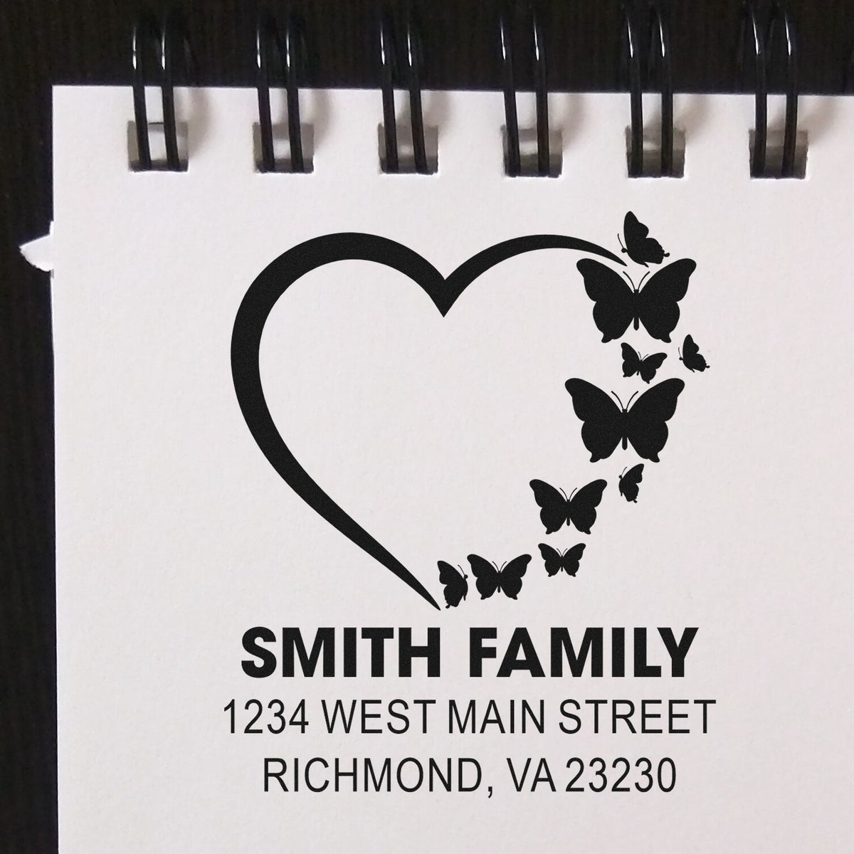 Custom rubber stamp return address design with heart and butterflies for Smith Family, Richmond, VA 23230.