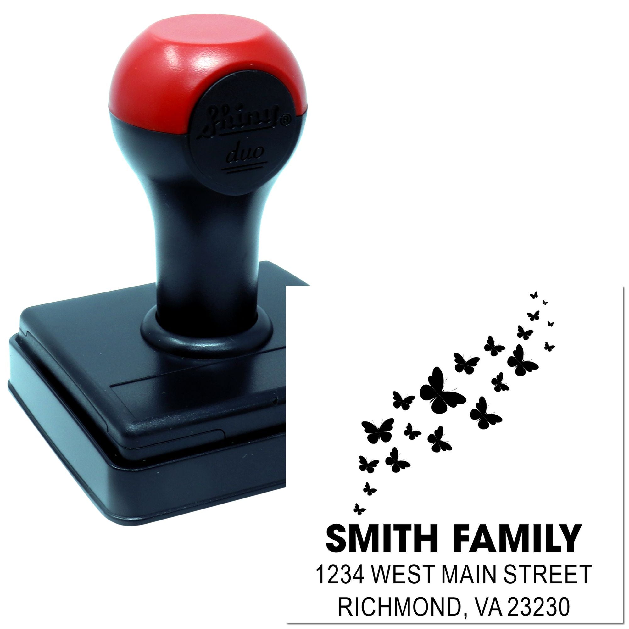 Custom self-inking rubber address stamp with butterfly design for Smith Family return address and mailing labels