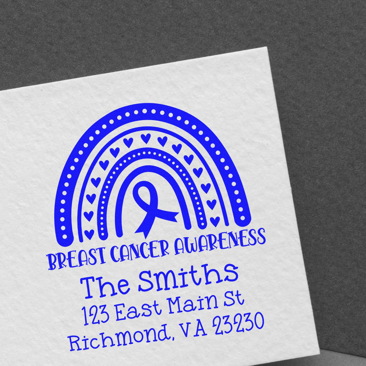 Custom breast cancer awareness address stamp with rainbow hearts, ribbon, and The Smiths return address.