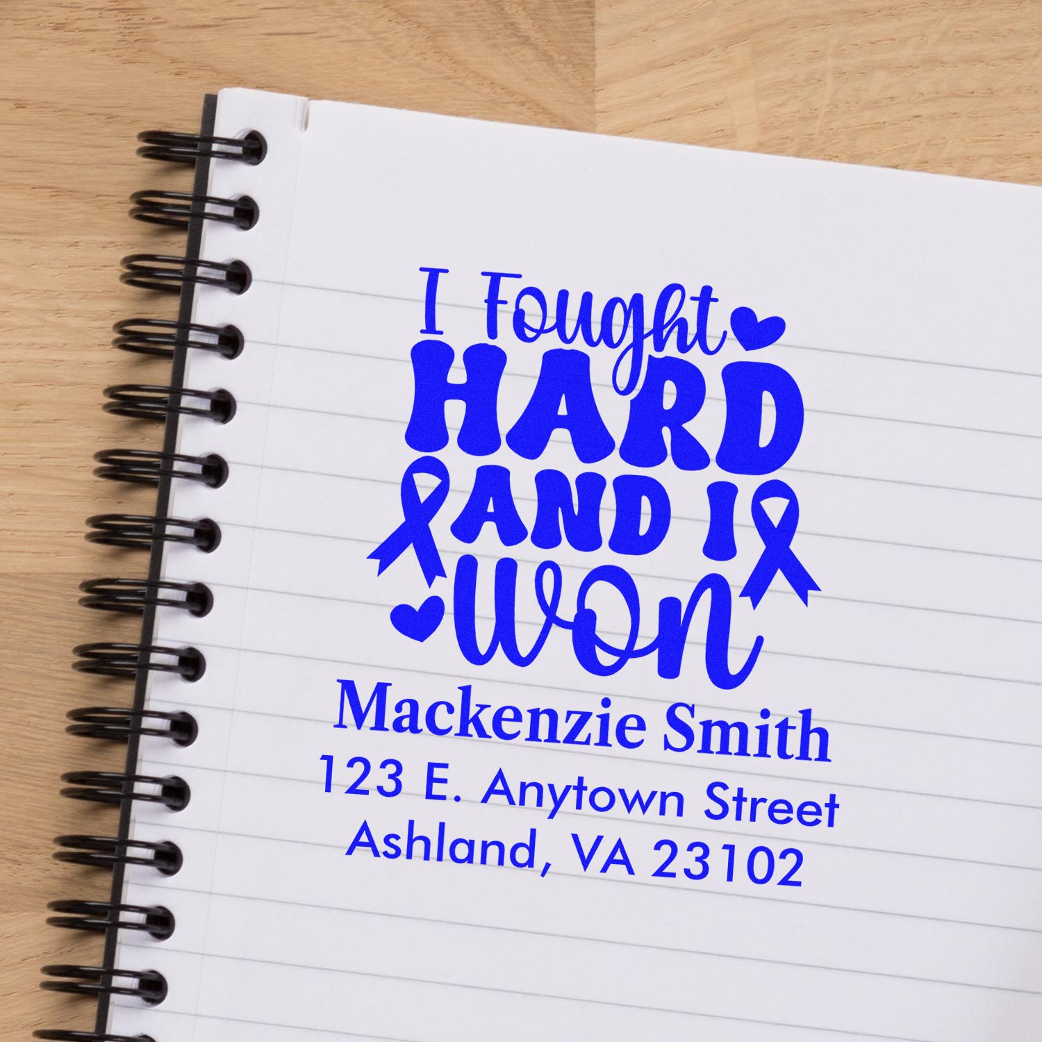 Custom rubber stamp mockup with I fought hard and I won breast cancer ribbon design, personalized with name and address.