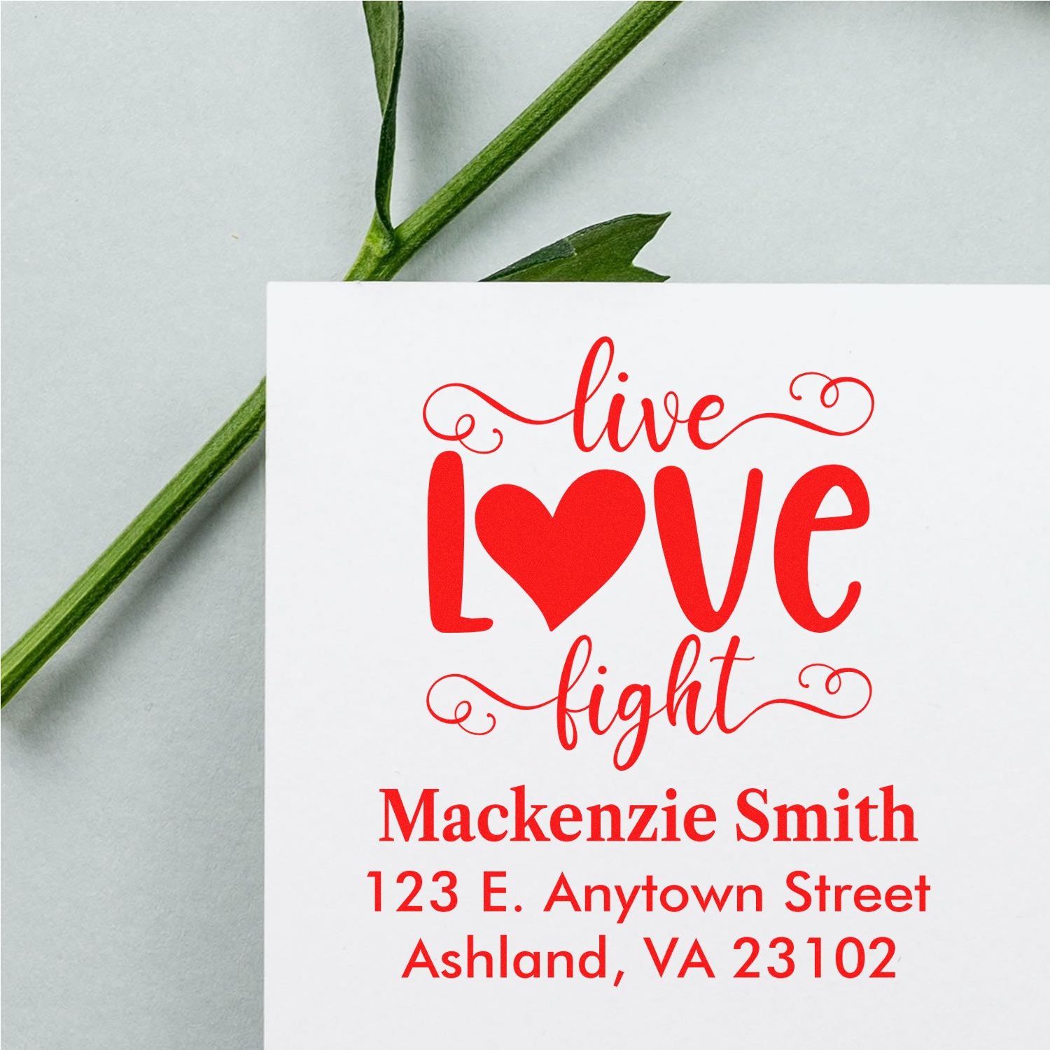 Personalized custom rubber stamp with live love fight and return address for wedding invitations or stationery.