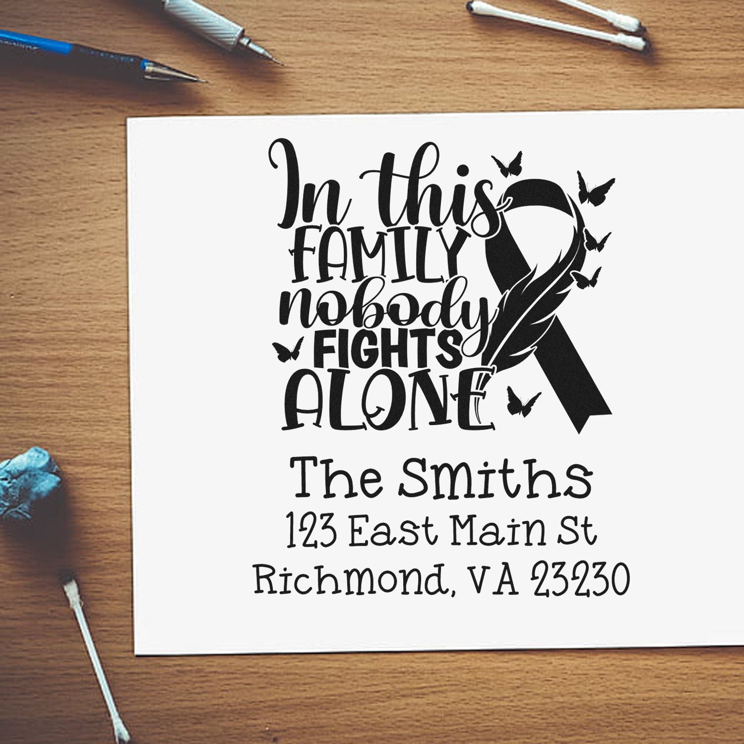 Custom family awareness ribbon rubber stamp with butterflies and return address, reading In this family nobody fights alone.