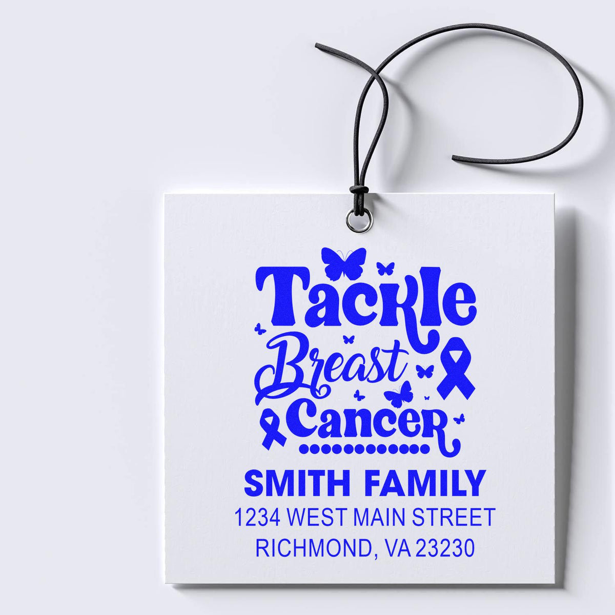 Personalized rubber stamp for breast cancer awareness gift tags, featuring Tackle Breast Cancer and Smith Family address.