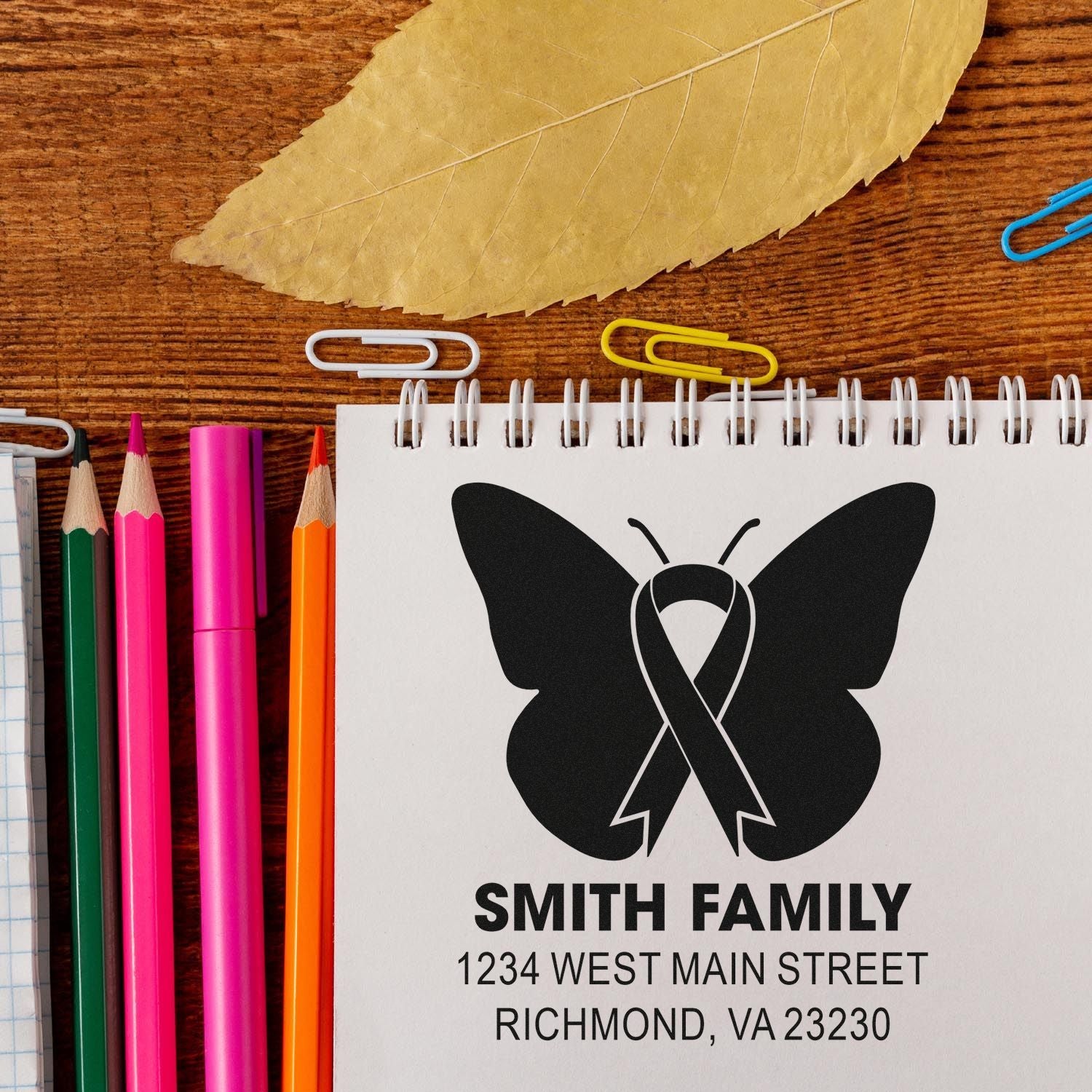 Custom butterfly ribbon return address rubber stamp for Smith Family stationery, featuring Richmond, VA address and memorial design.