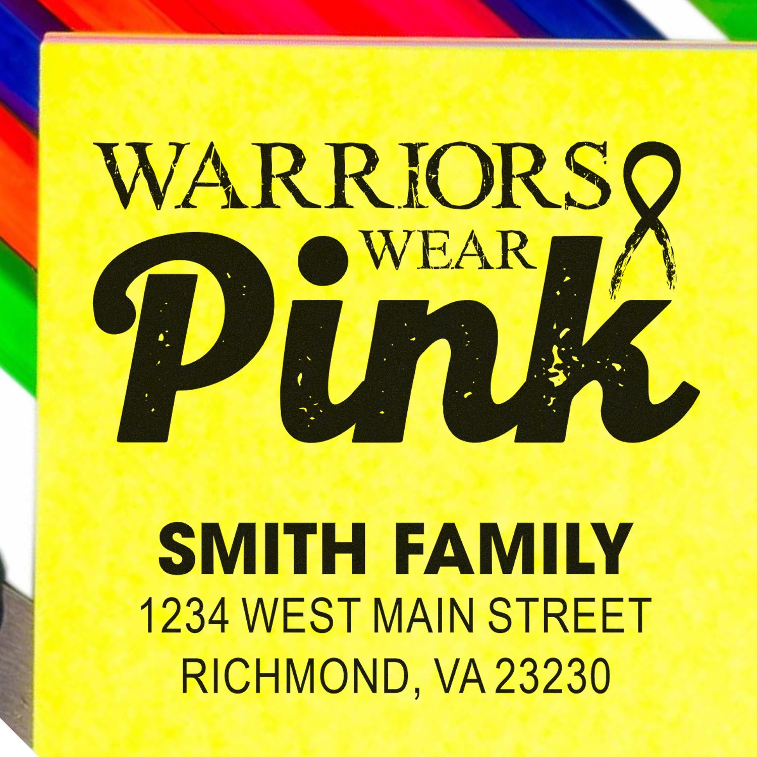 Custom rubber stamp reading Warriors Wear Pink with pink ribbon, Smith family name, and return address for breast cancer awareness.