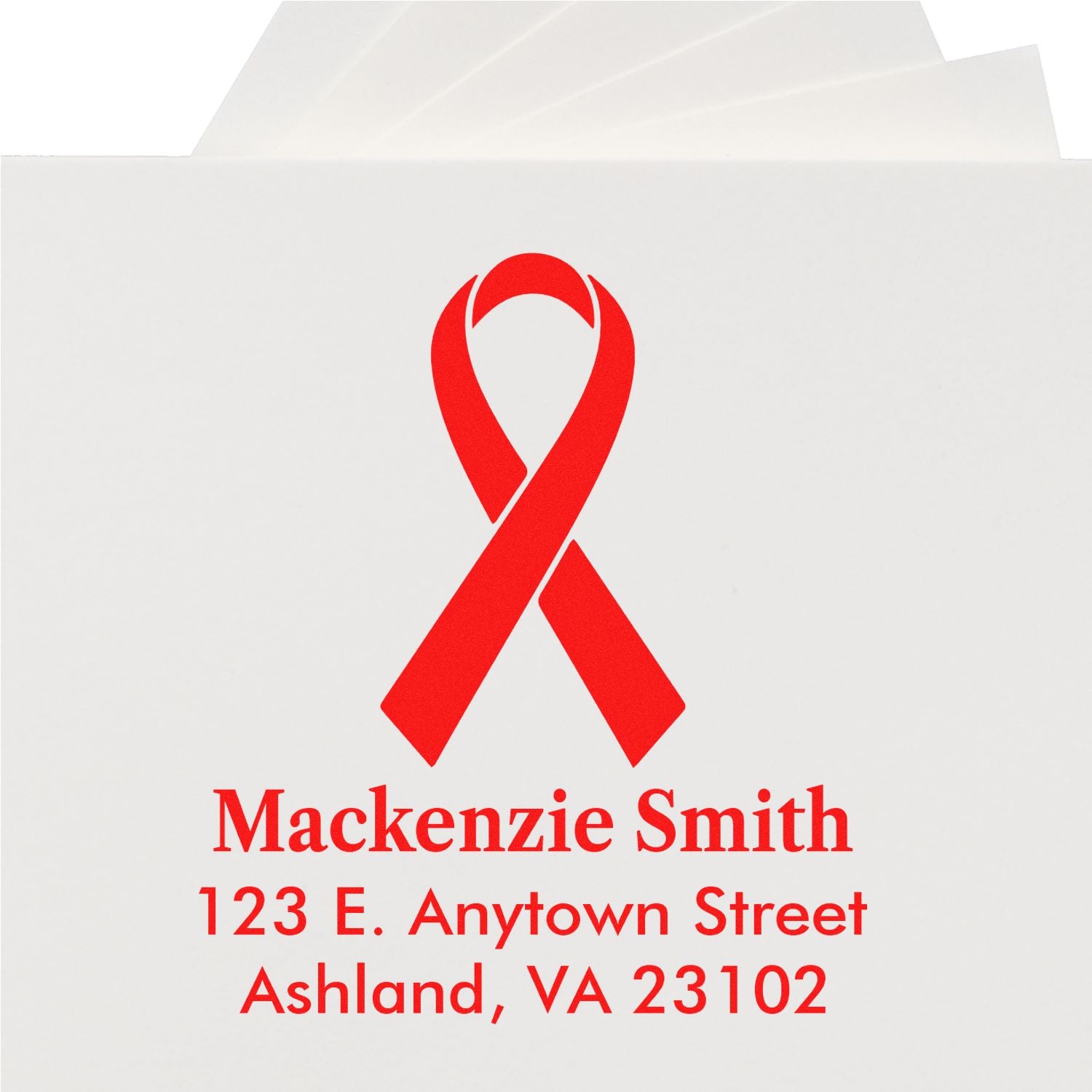 Custom return address rubber stamp with red ribbon logo for Mackenzie Smith, Ashland, VA 23102.