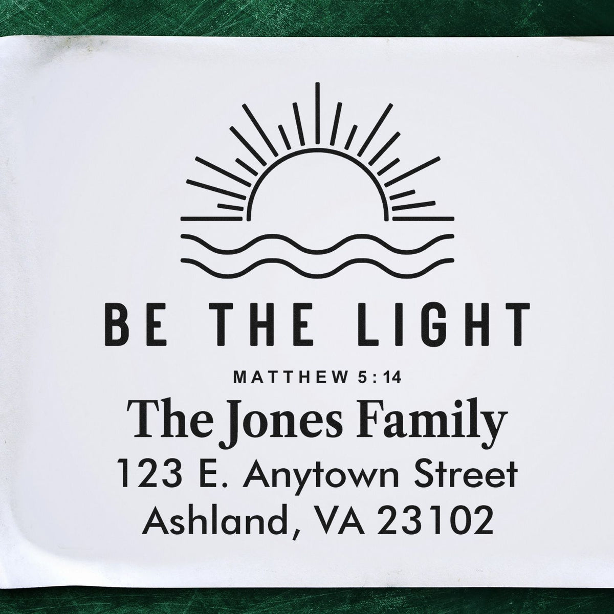 Personalized rubber stamp design with Be the Light Matthew 5:14 and custom family return address for faith-based mail.