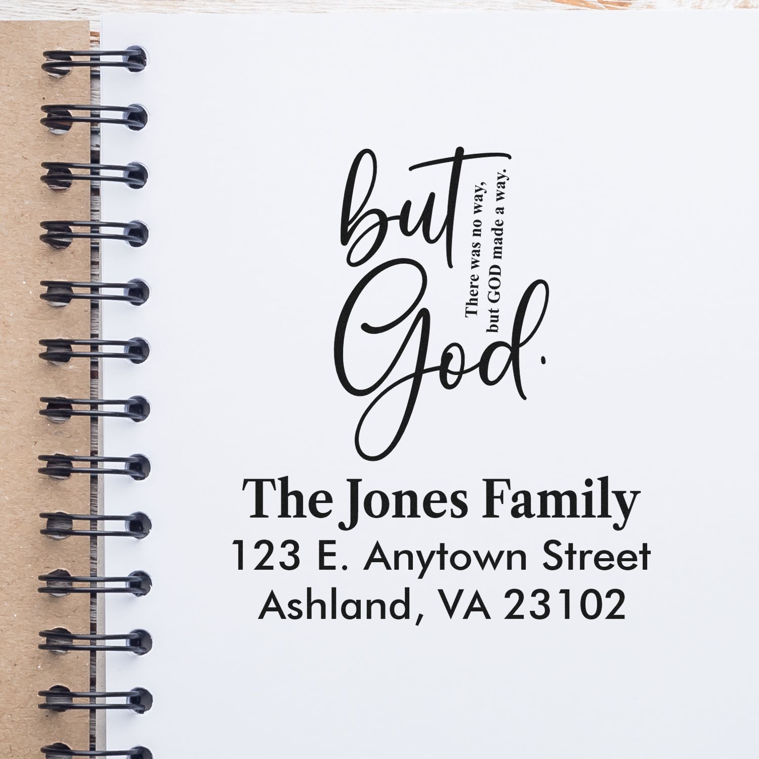 Custom rubber stamp with But God Christian quote and family return address for personalized stationery.