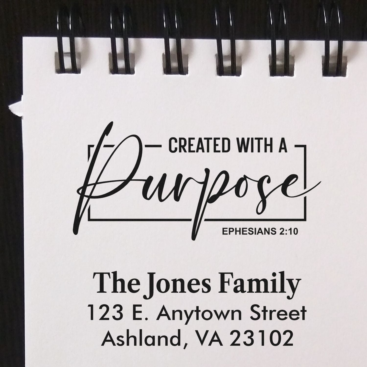 Custom rubber stamp design with Created with a Purpose Ephesians 2:10 and The Jones Family return address.