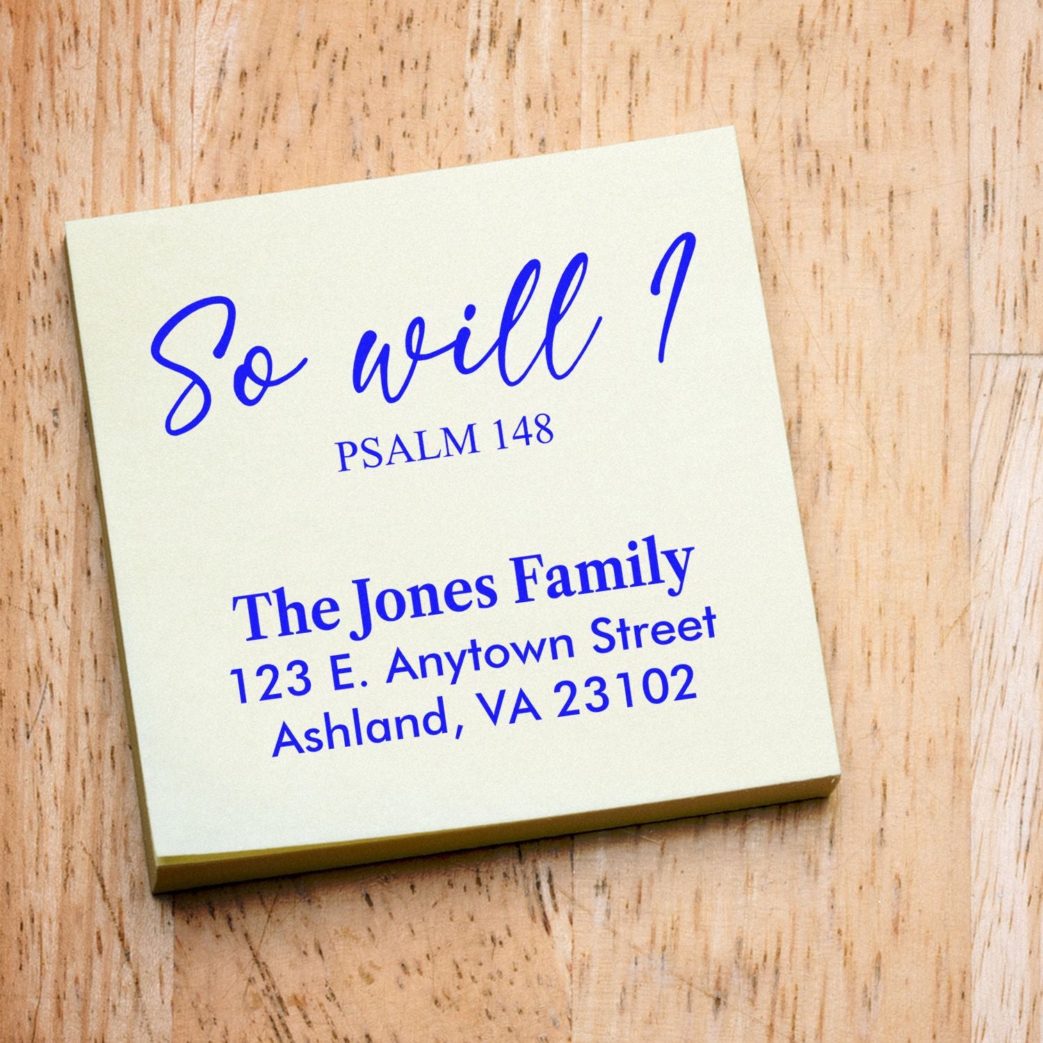 Personalized address stamp with Psalm 148, The Jones Family, and return address in blue ink.