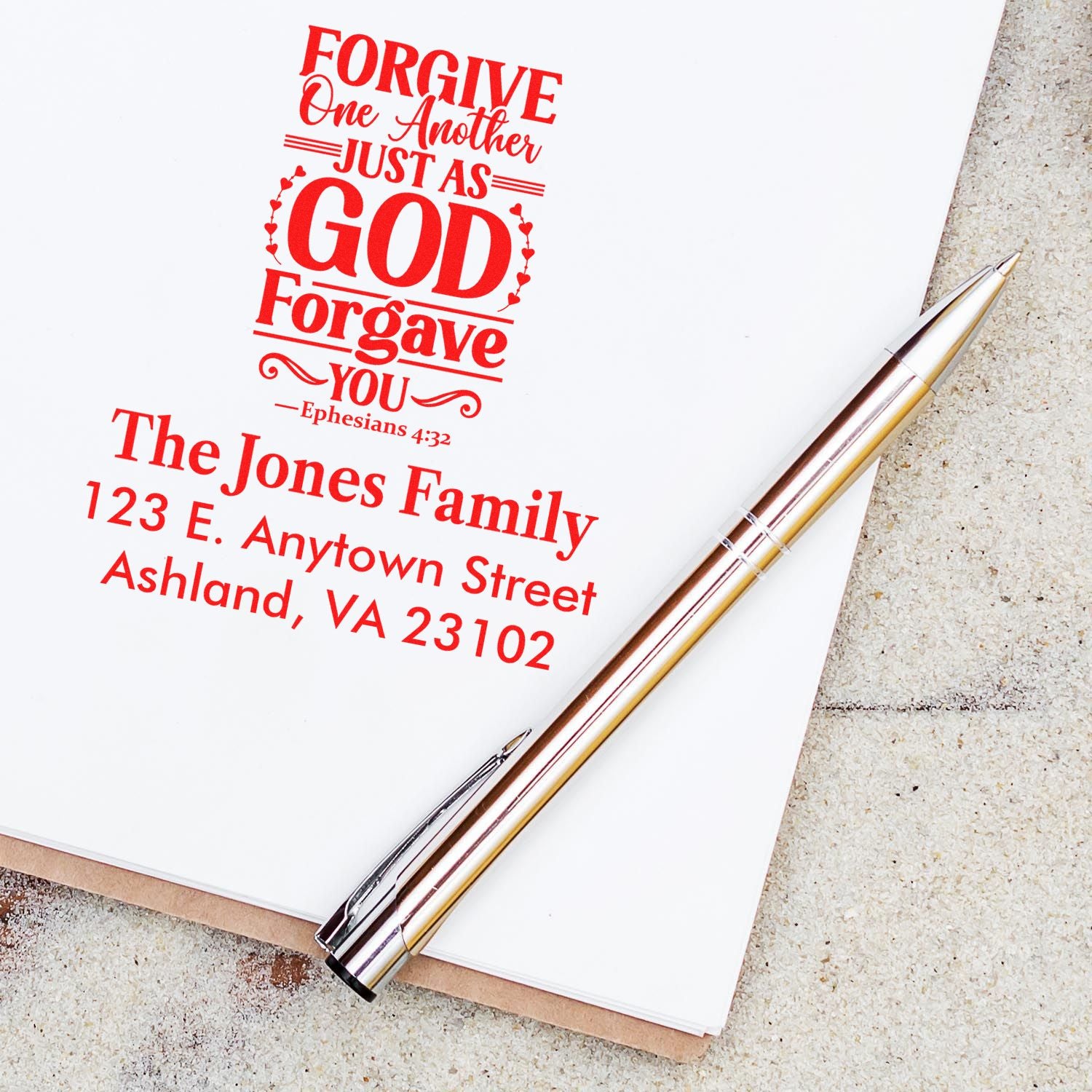 Custom Christian rubber stamp with Ephesians 4:32 forgiveness quote and family address for cards and stationery.