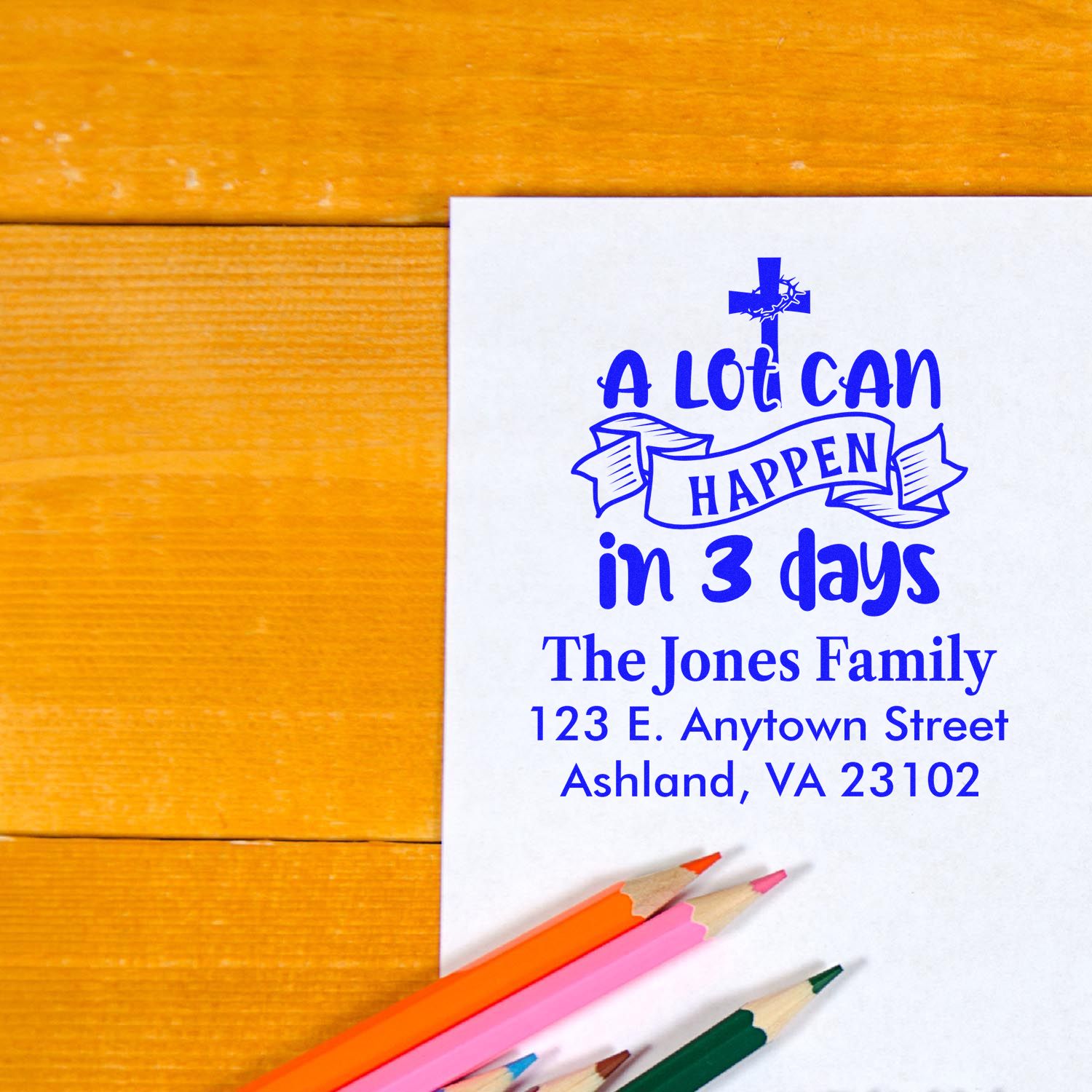 Custom Christian return address rubber stamp with A lot can happen in 3 days design, family name, and address on white paper.