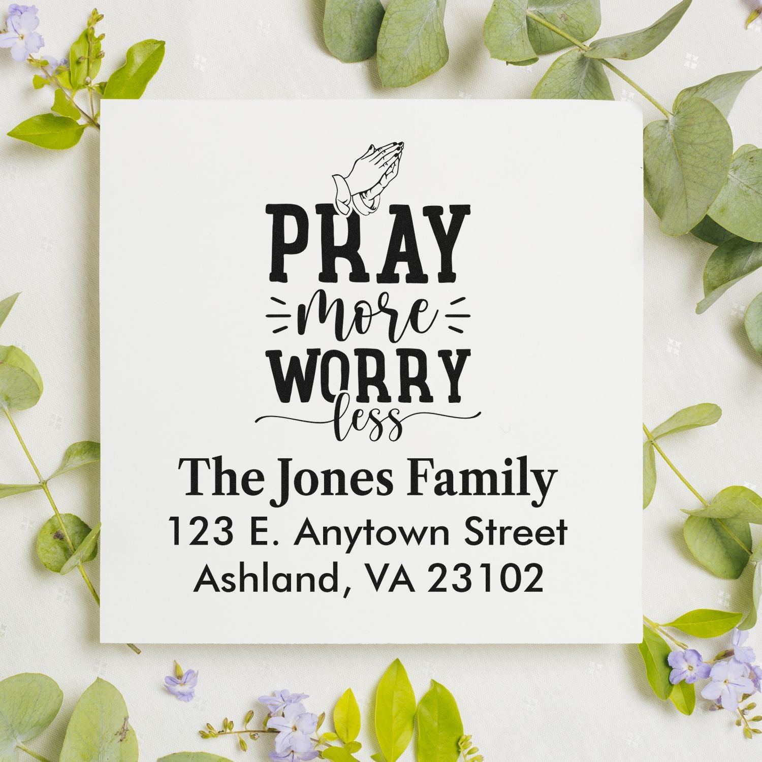 Personalized rubber stamp with Pray More Worry Less and return address for The Jones Family, Ashland, VA 23102.