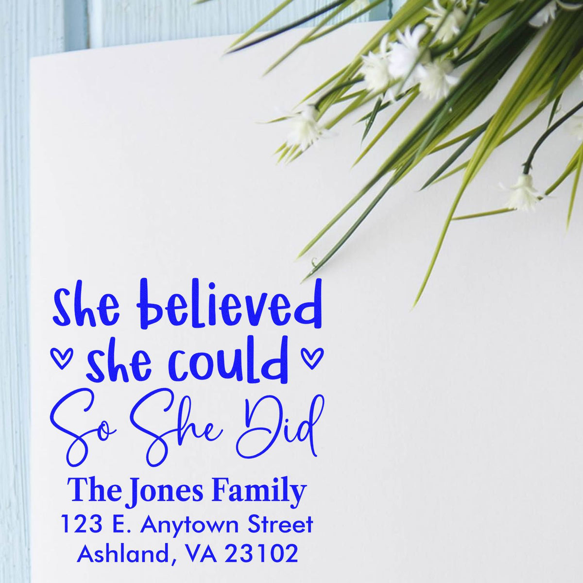 Personalized return address rubber stamp with She Believed She Could So She Did quote for family mailings.
