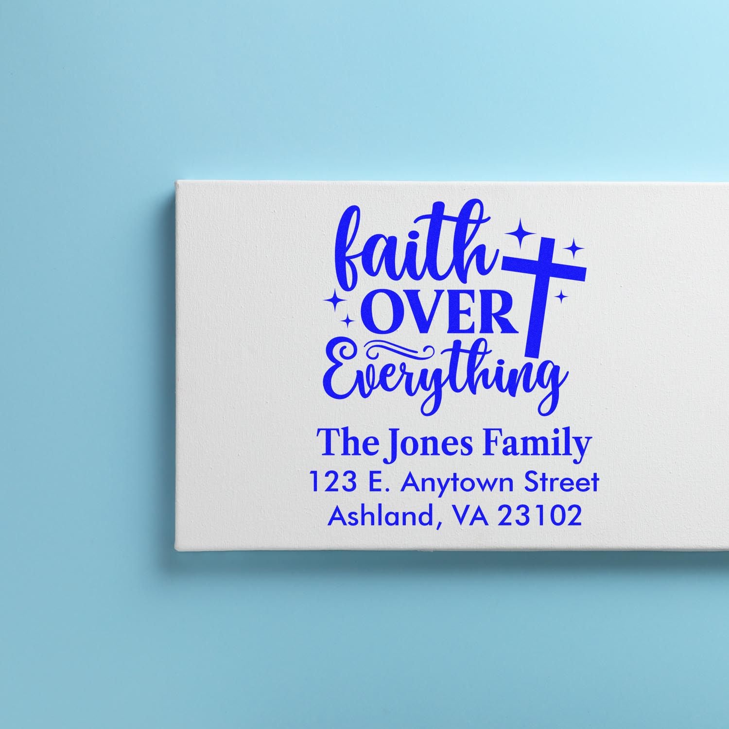 Custom faith over everything rubber stamp for The Jones Family, featuring a personalized return address in blue.