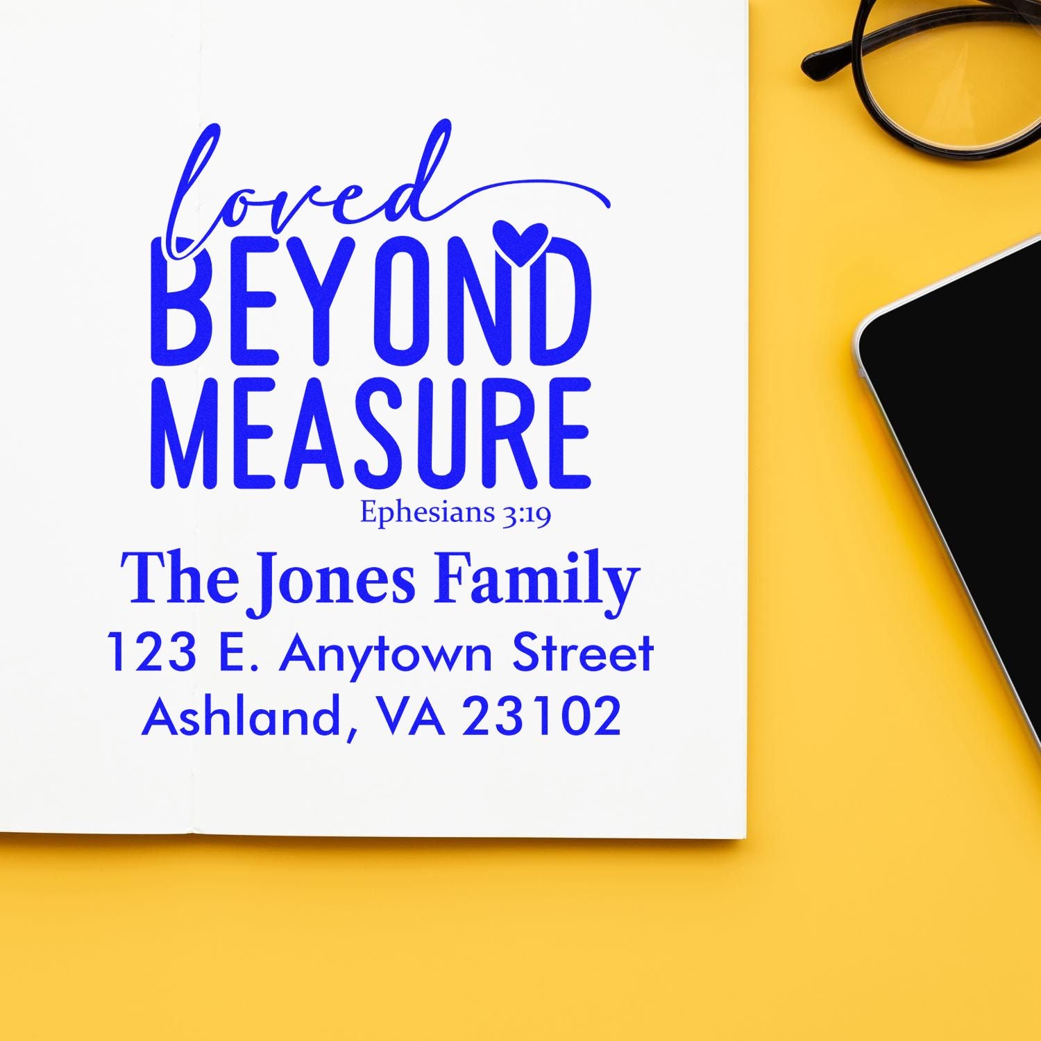 Custom rubber stamp with Loved Beyond Measure Bible verse, family name, and return address for personalized mail.