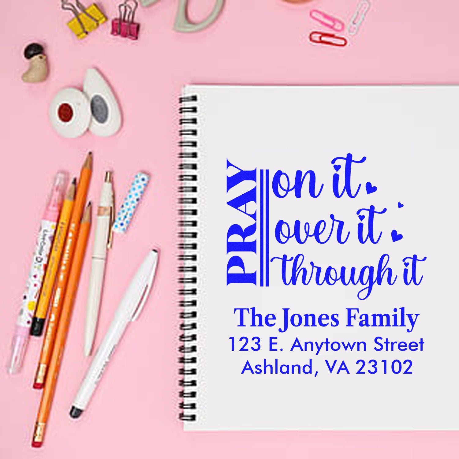 Personalized rubber stamp with Pray on it, over it, through it quote and family return address.