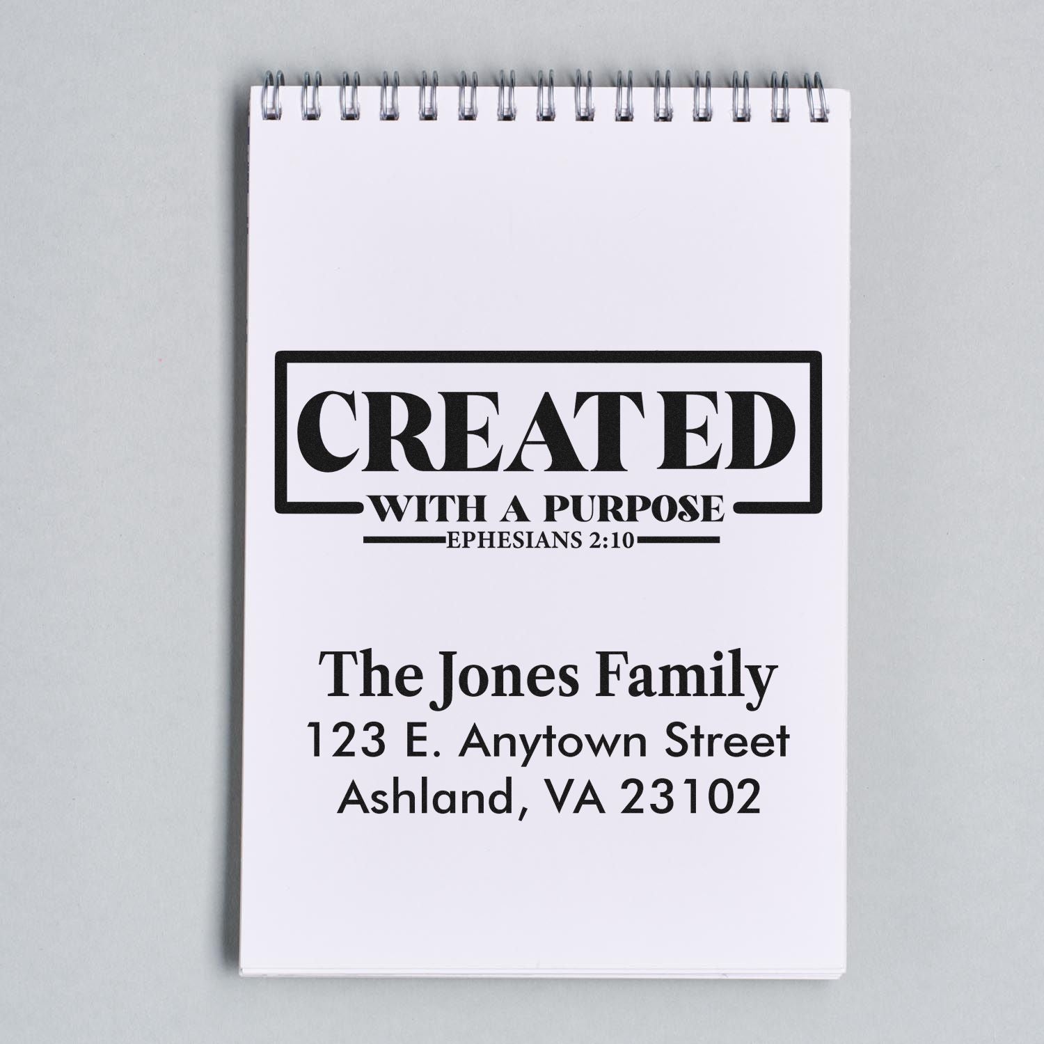 Custom rubber stamp design with Created with a Purpose and family address for personalized Christian stationery.