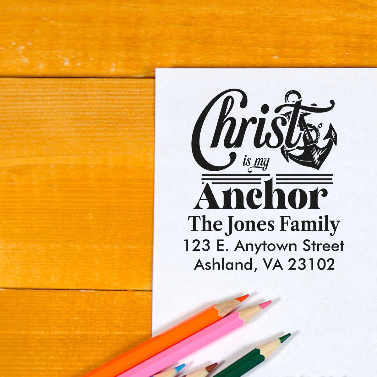 Personalized Christian rubber stamp with anchor design, family name and address for custom envelope and return mail use.