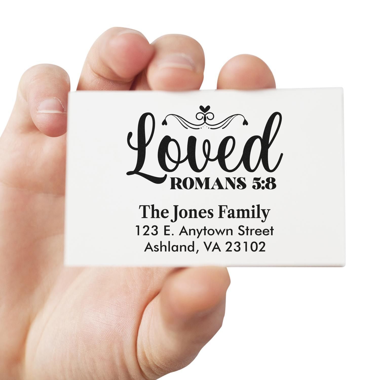 Custom return address rubber stamp with Loved Romans 5:8 and The Jones Family address.