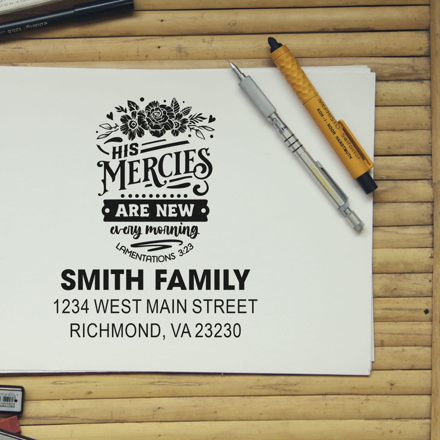 Custom rubber stamp proof featuring Bible verse, floral design, and Smith family address for personalized stationery.