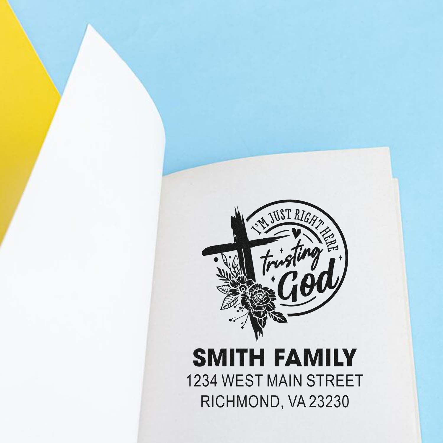 Custom Christian return address rubber stamp with cross and floral design, featuring Trusting God and Smith Family address.