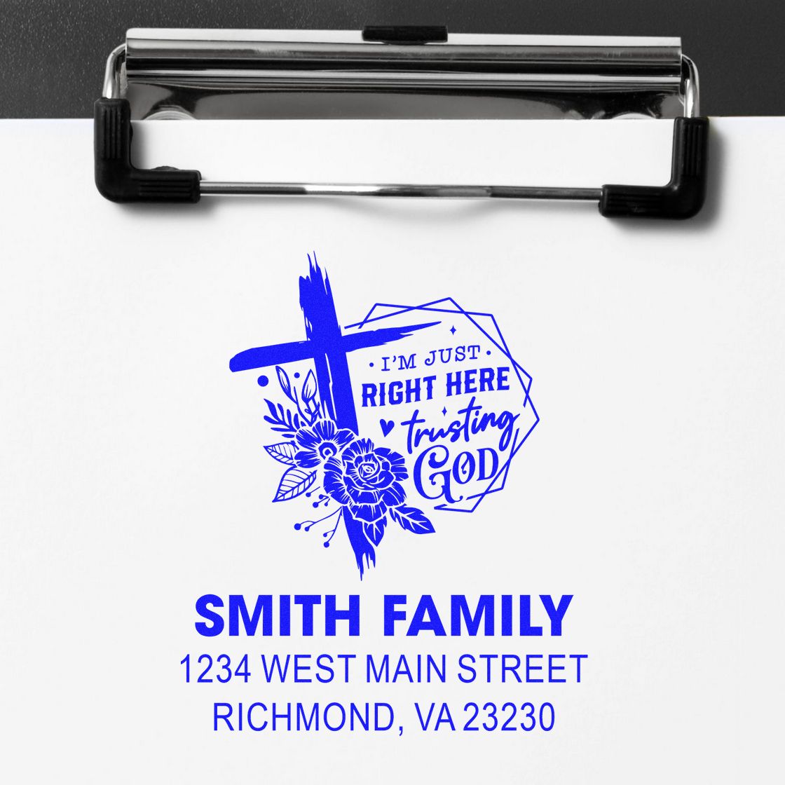 Custom return address rubber stamp for Smith Family, with cross, flowers, and trusting God design.
