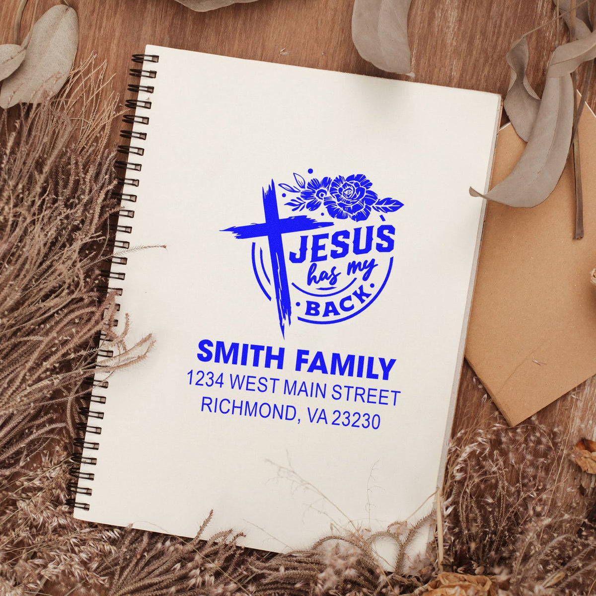 Custom Christian family address rubber stamp with cross and floral Jesus Has My Back design for Smith Family mail.