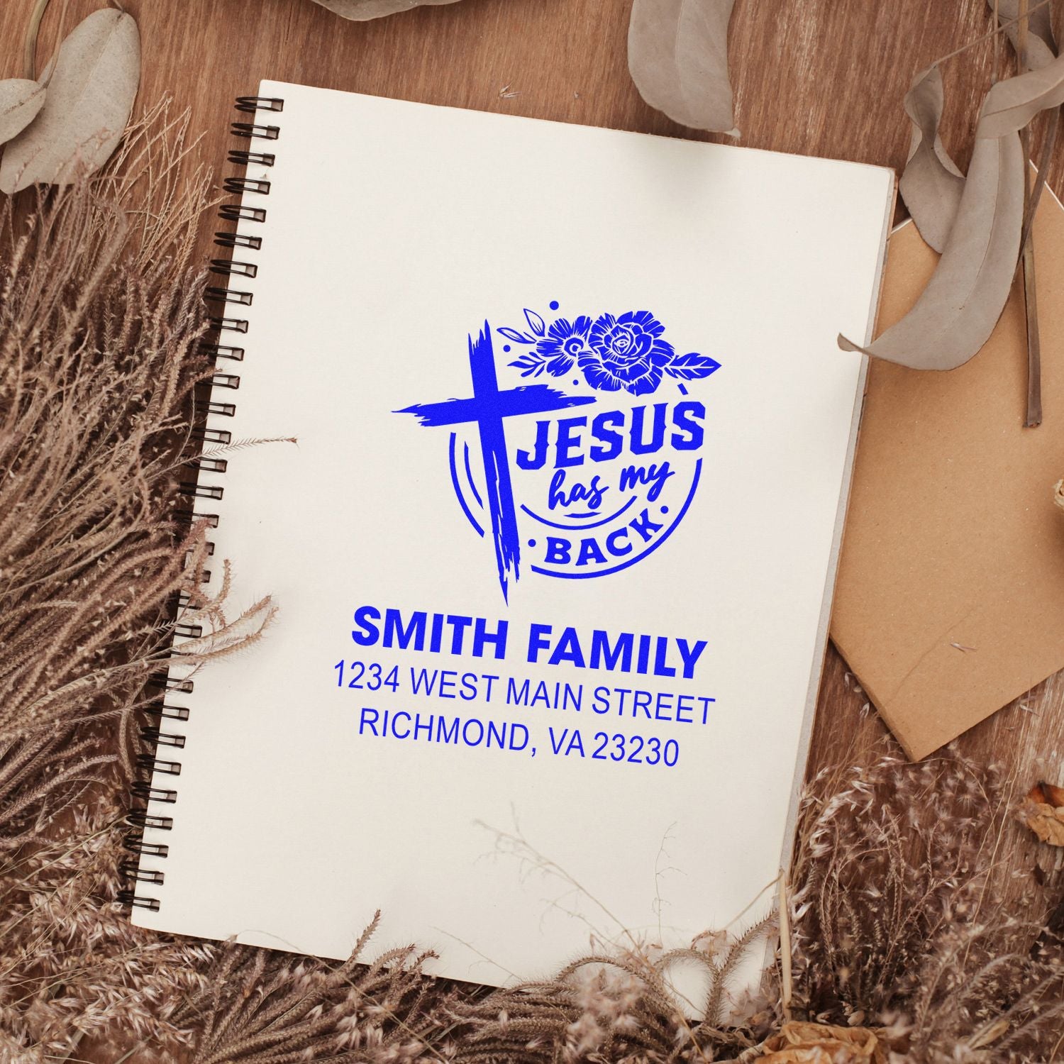 Custom Christian rubber address stamp with cross and floral design reading Jesus has my back for Smith family, Richmond, VA