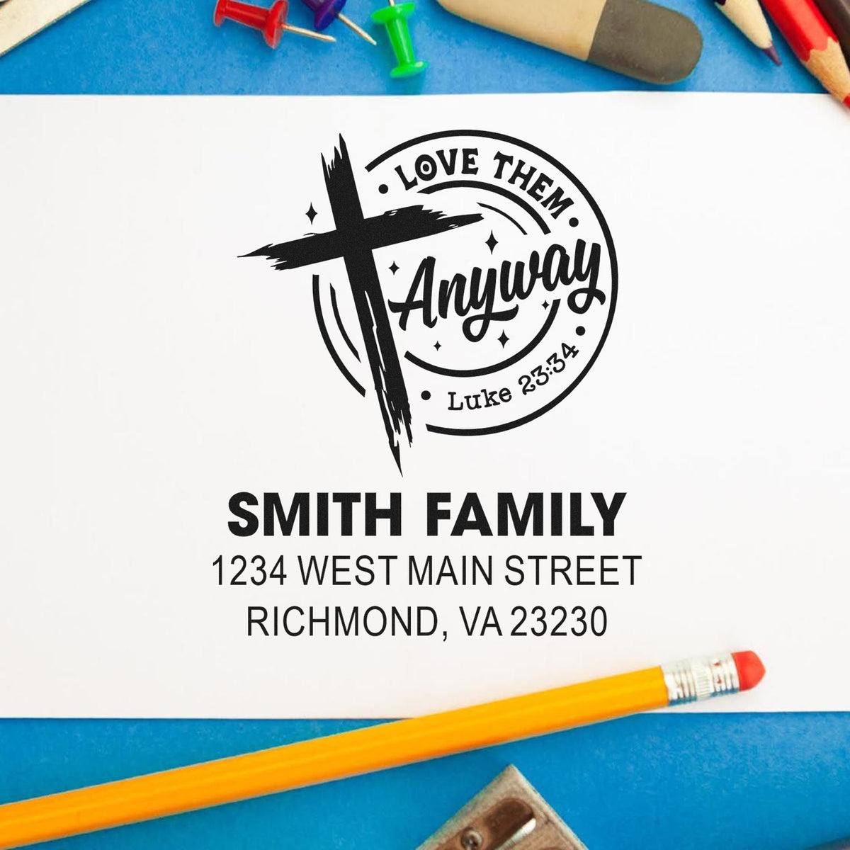 Custom Christian family address rubber stamp with cross, Love Them Anyway verse, and Smith family mailing address.