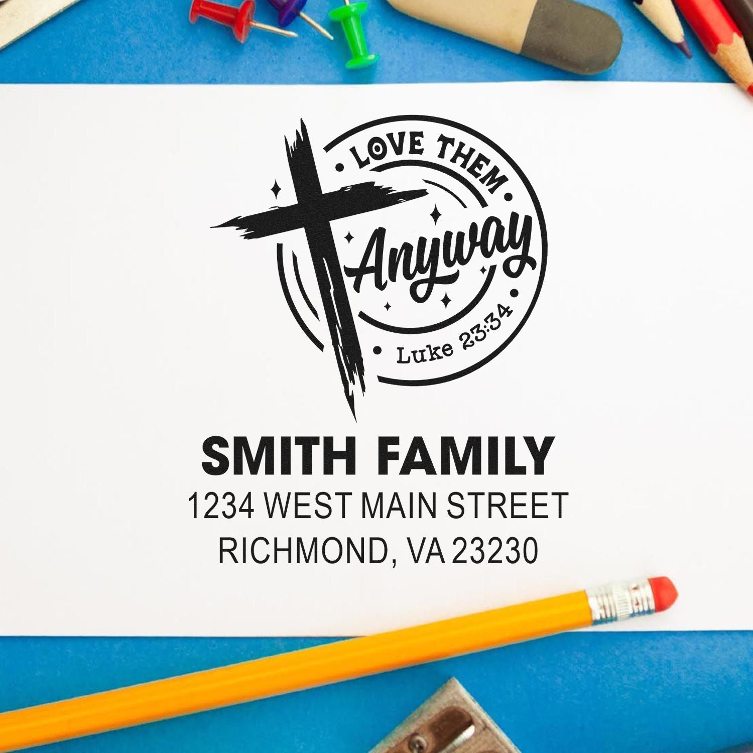 Personalized Christian return address rubber stamp design with cross, Love Them Anyway and Luke 23:34, Smith Family address.