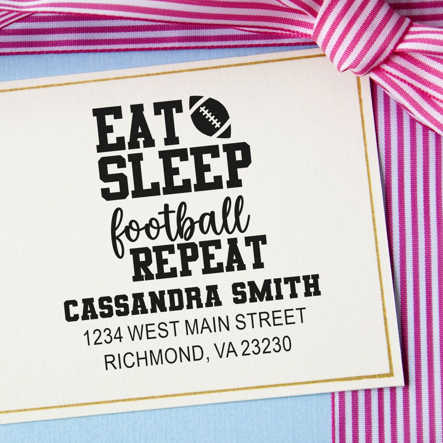 Custom football rubber stamp with Eat Sleep Football Repeat and personalized return address for Cassandra Smith, Richmond, VA.