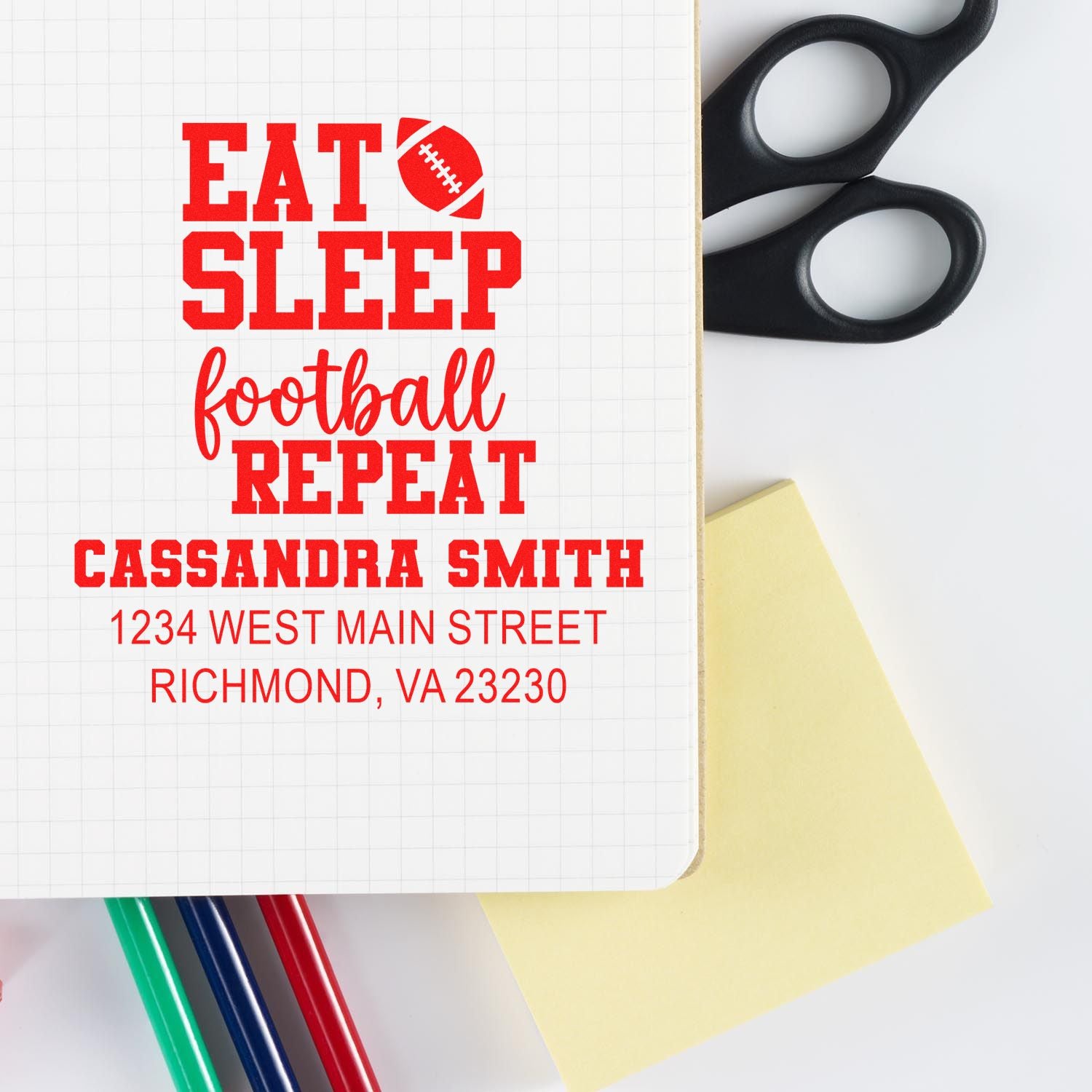 Custom football rubber stamp design with Eat Sleep Football Repeat, name, and address for personalized stationery.