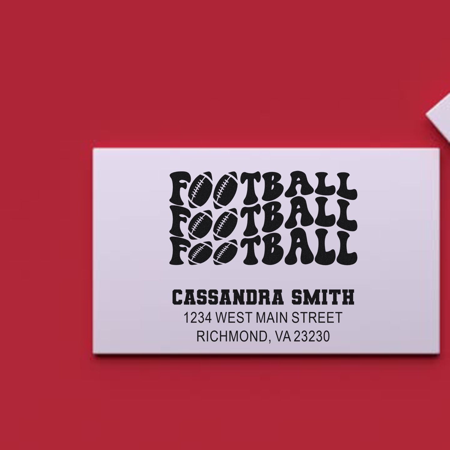 Football-themed personalized rubber address stamp with Cassandra Smith name and Richmond, VA address