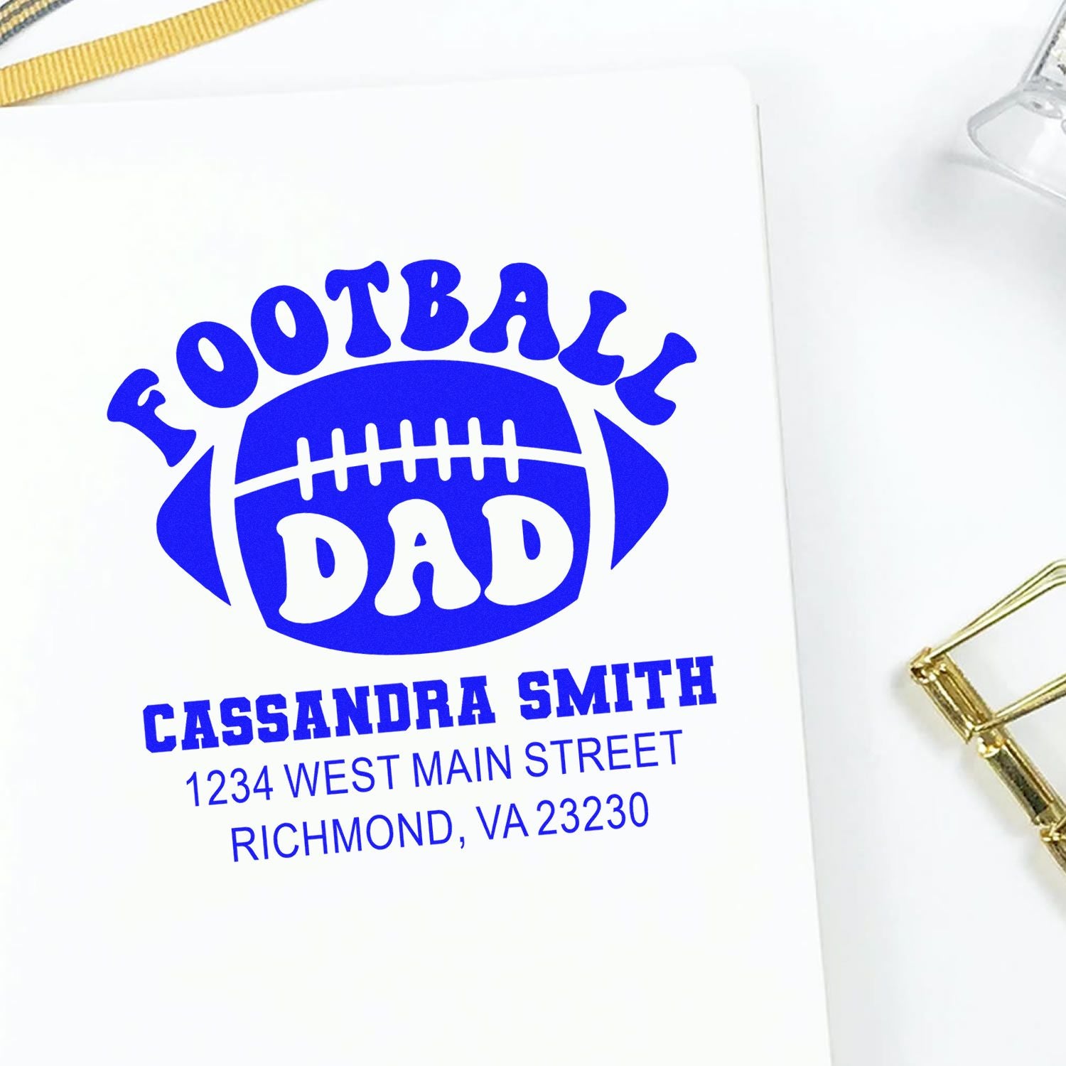 Custom football dad address rubber stamp imprint with name and address in blue ink
