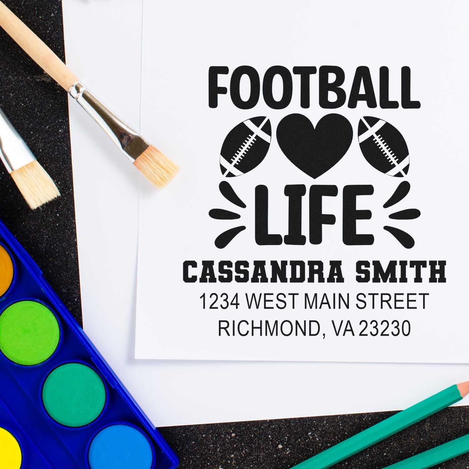 Custom football life rubber stamp with name and address, ideal for personalized sports-themed stationery and gifts.