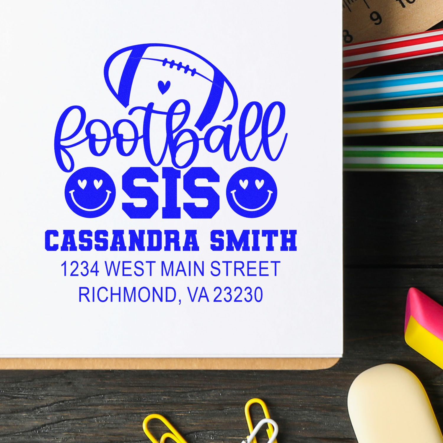 Custom football sis rubber stamp with name and address for Cassandra Smith, Richmond, VA.