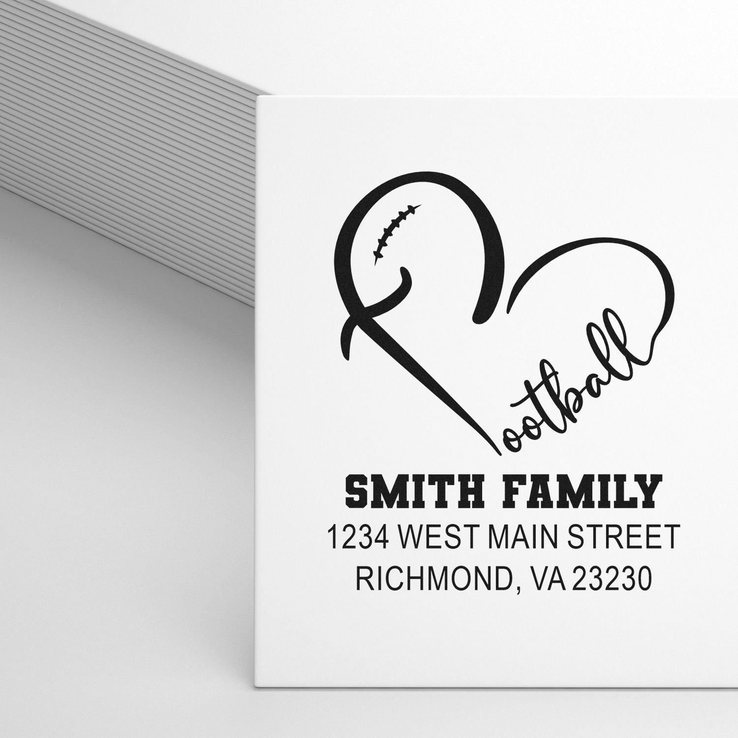 Personalized football heart return address rubber stamp for Smith Family, Richmond, VA.