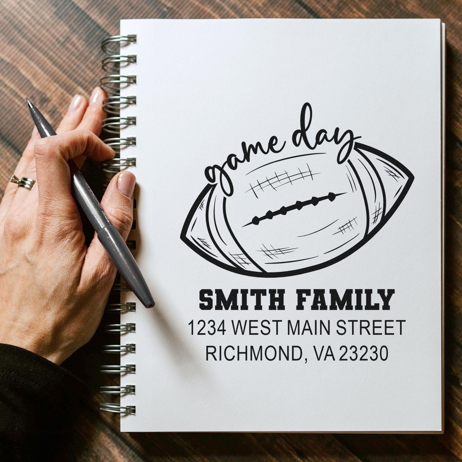 Custom football game day family return address rubber stamp design on notebook, personalized with Smith family, Richmond, VA.