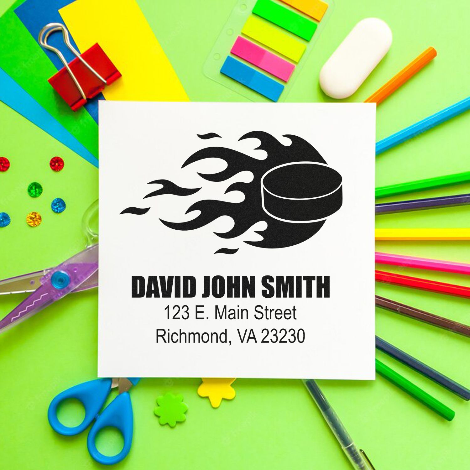 Custom address rubber stamp mockup with name, address, and logo for personalized business mailing.