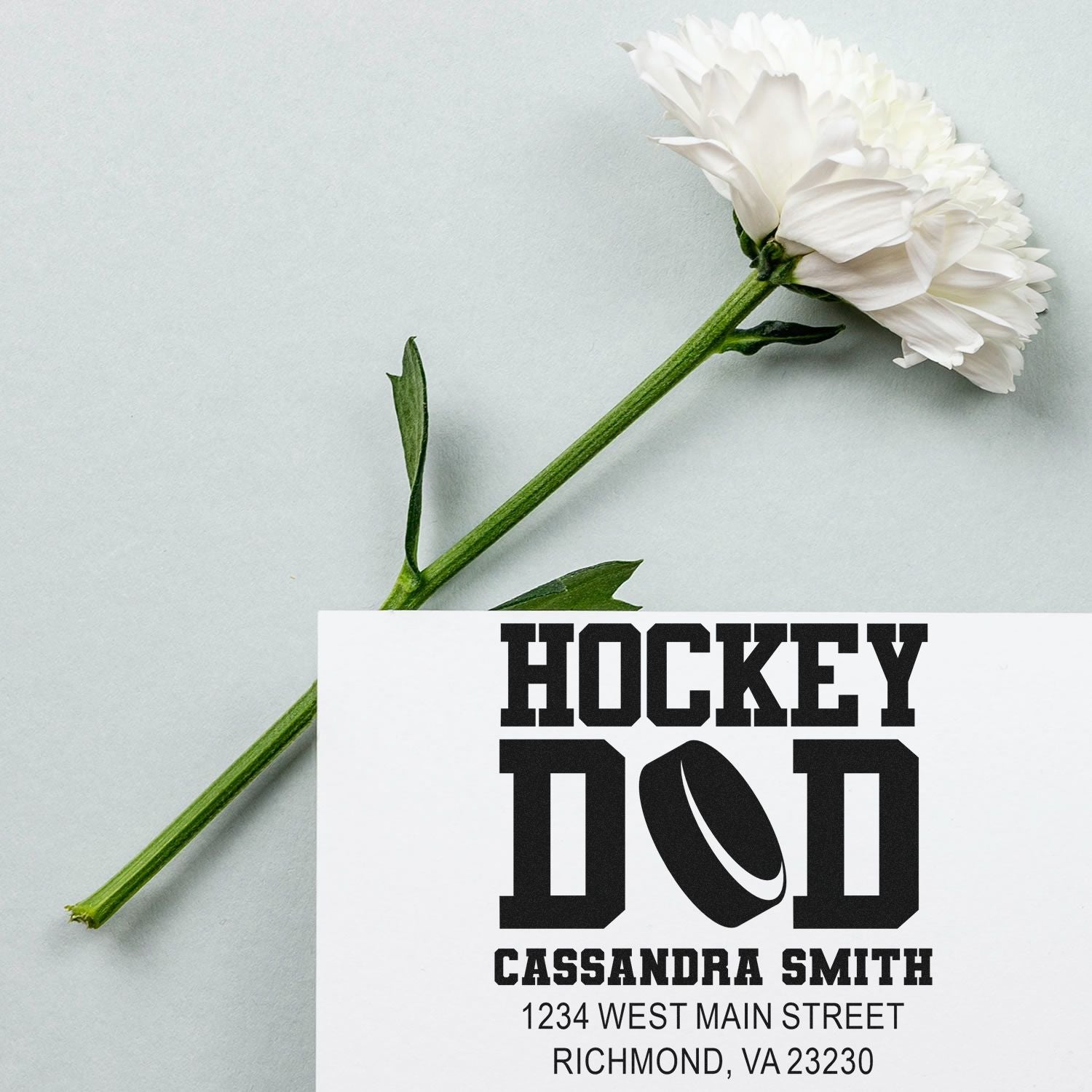 Personalized hockey dad rubber stamp with name and return address for custom sports mailings.