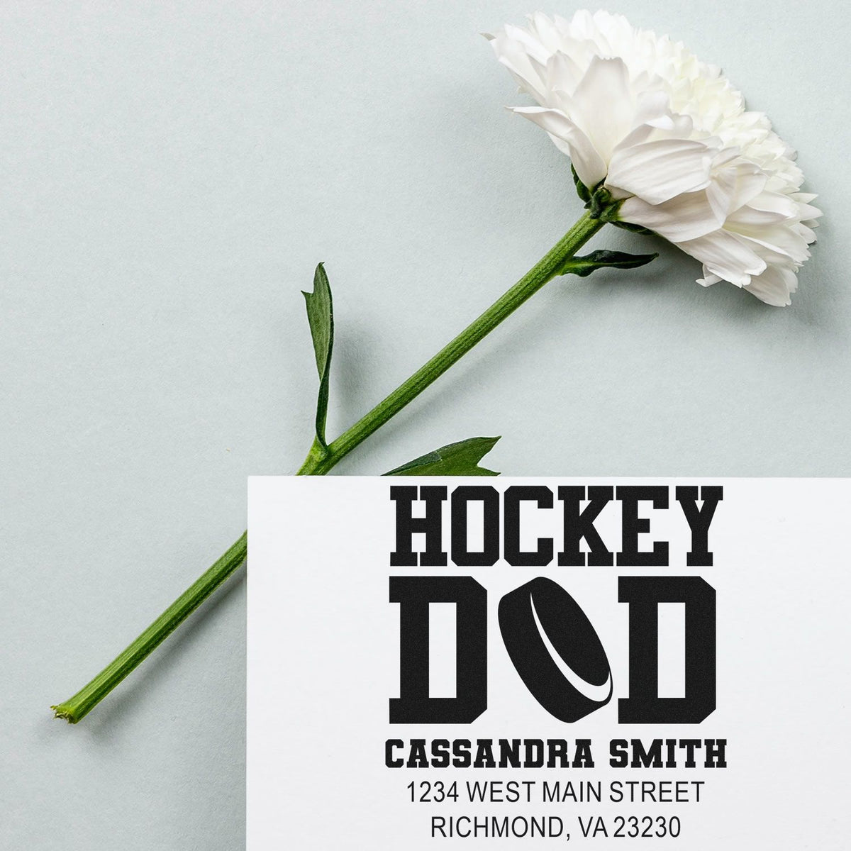 Personalized hockey dad return address rubber stamp with custom name and address for sports-themed mailing.