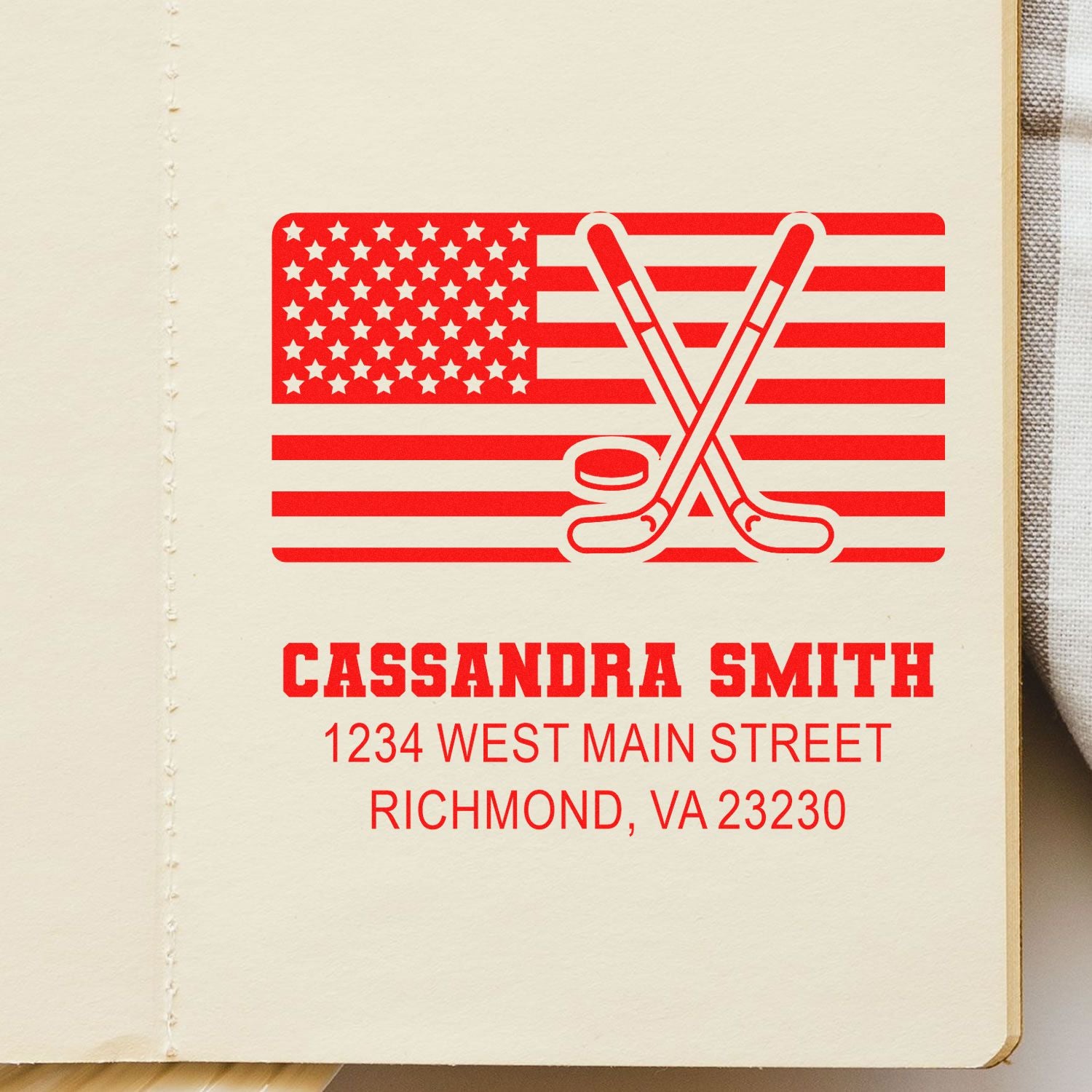 Personalized hockey rubber stamp with USA flag, crossed sticks, and custom address for envelopes.